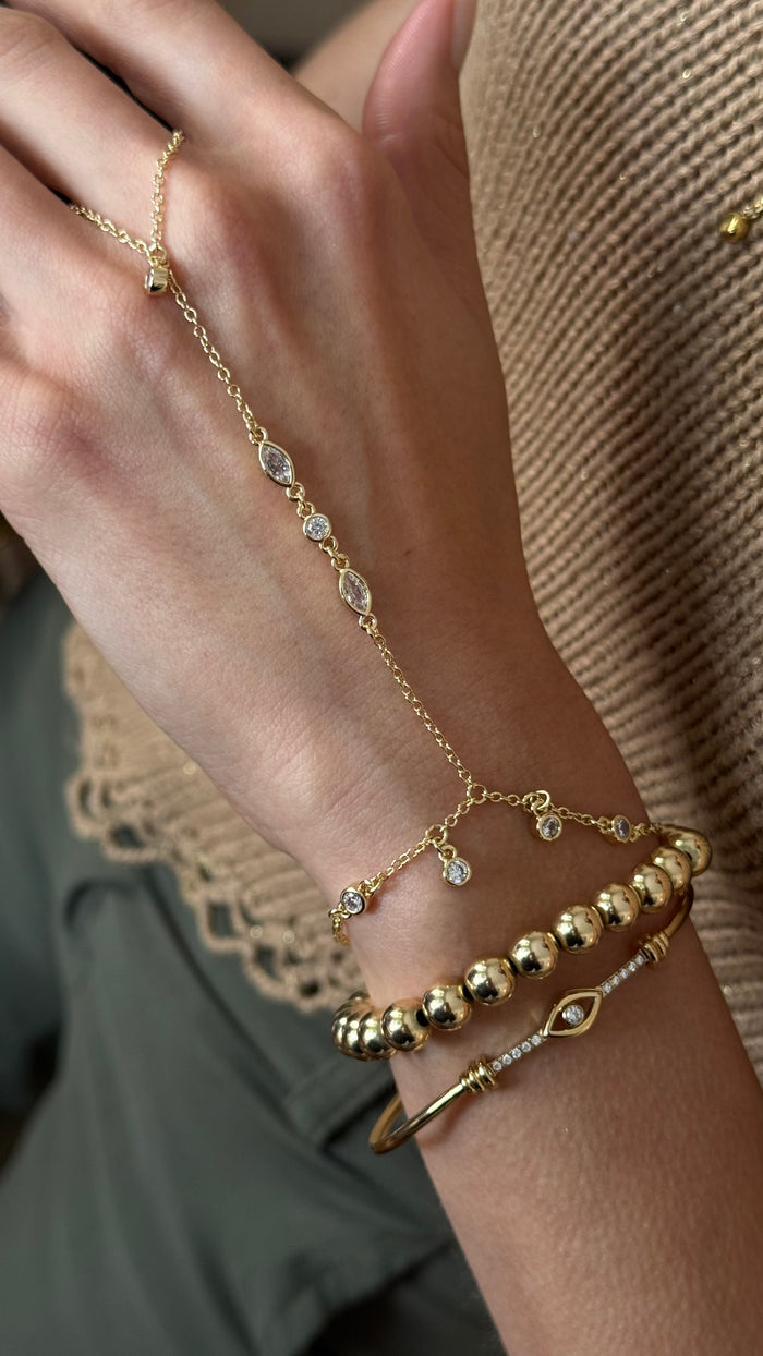 Delicate Mykayla hand chain finished with a celestial star charm detail
