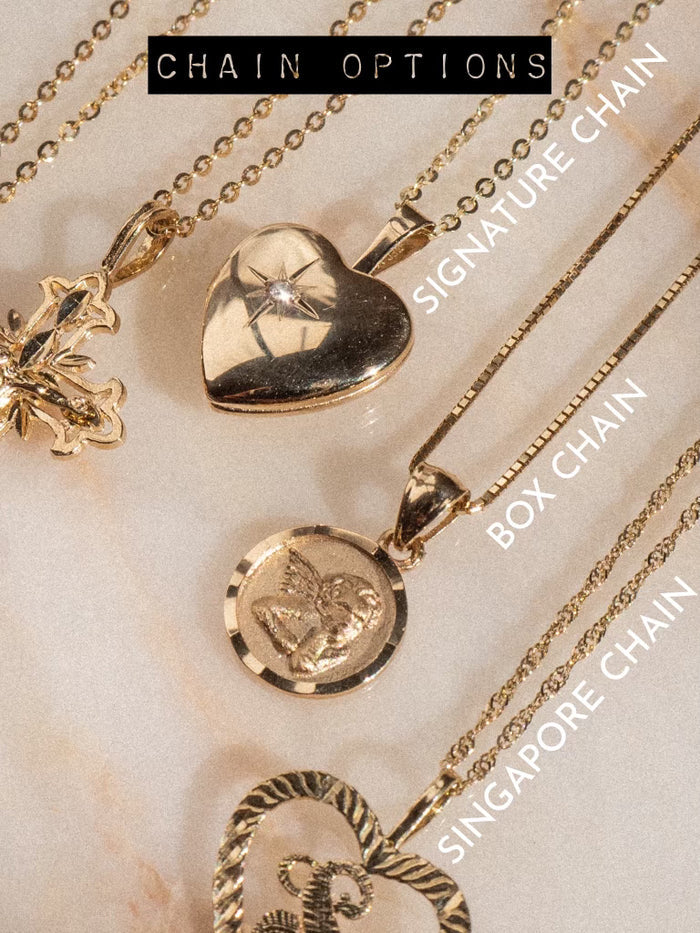 The Corazon initial pendant in 14k solid gold by Beads by Tara