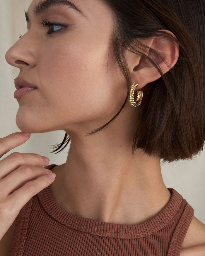 Bryan Anthonys Aligned Beaded Hoop Earrings On Model