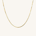 Close up of the gold Amanda layering chain necklace on a white background
