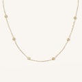 The Anna bezel necklace with bezel-set crystal stations in gold fill
