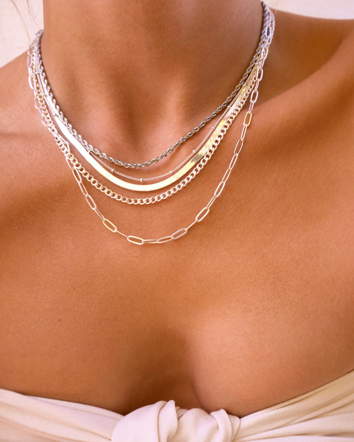 Sterling silver Azin necklace with small bead accents on a thin cable chain
