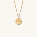 The Bailey circle necklace with a crystal-accented bail in gold