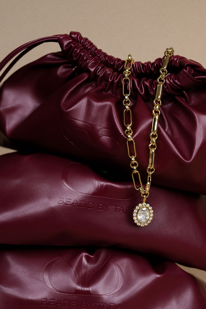 Bardot pouch with a vegan suede lining that protects delicate jewelry