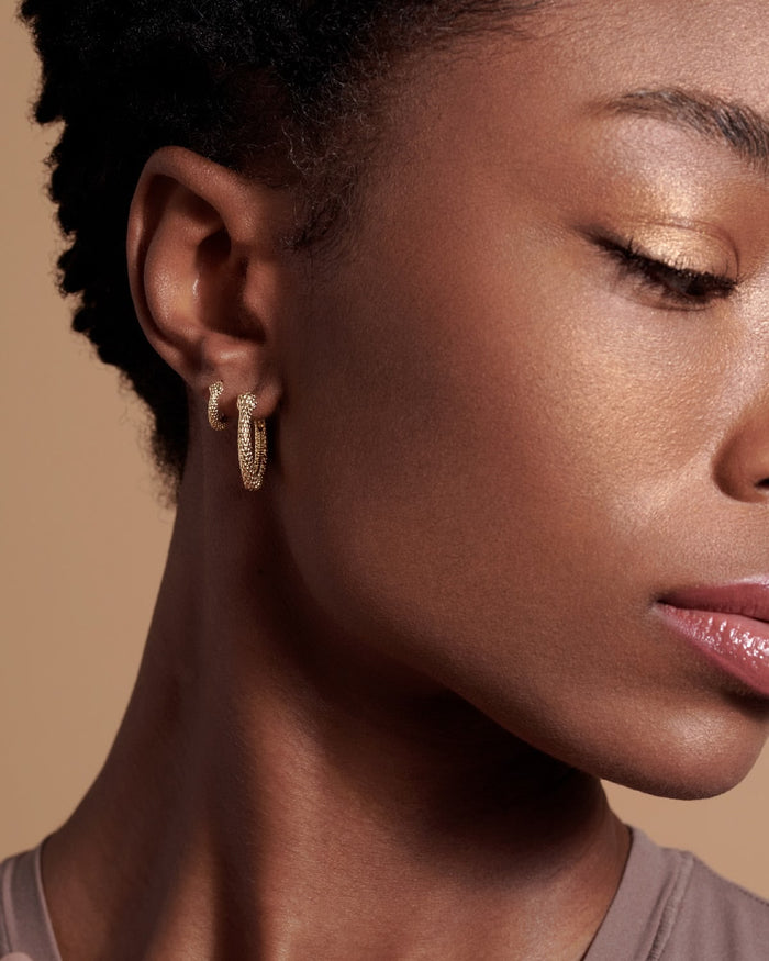 Bryan Anthonys Begin Again Midi Hoop Earrings on Model in Gold