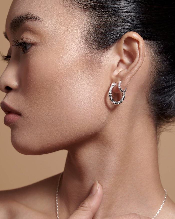 Bryan Anthonys Begin Again Midi Hoop Earrings on Model in Silver