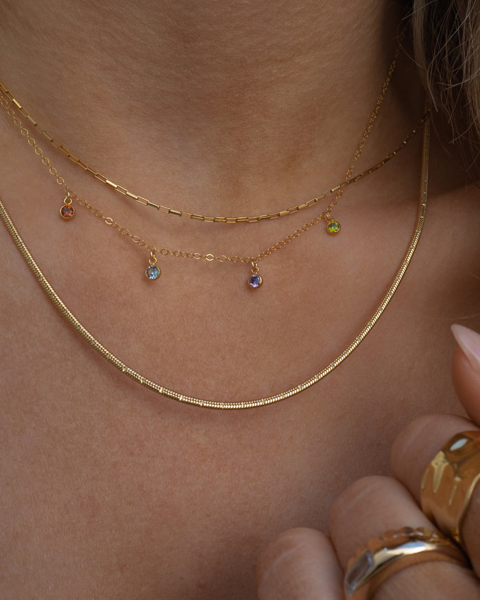 Detail of the gold Birthstone Drop necklace by Beads by Tara
