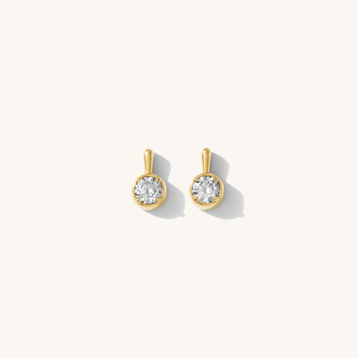 Close-up of earrings on a white background