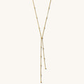 Gold necklace on a white background