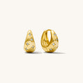 Chunky gold Celeste huggies scattered with tiny star-set sparkling stones