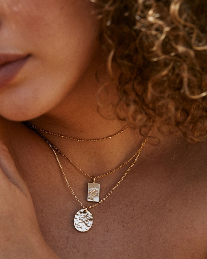 Bryan Anthonys Chasing Light Gold Necklace on Model