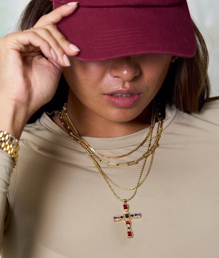 Jumbo cross pendant of the Dallas necklace, made to anchor a layered stack