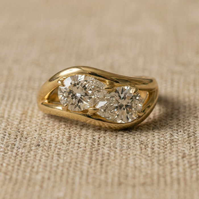 Vintage inspired gold pinky ring set with two pear shaped crystals