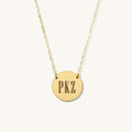 The Ella necklace, a dainty engravable pendant in 14k gold fill