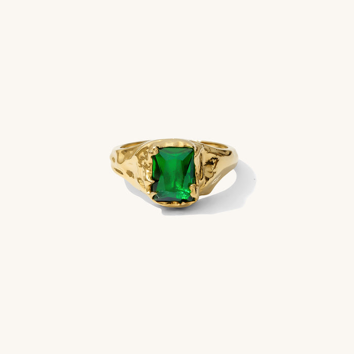 Empress ring with a rectangular emerald stone set in molten 18k gold