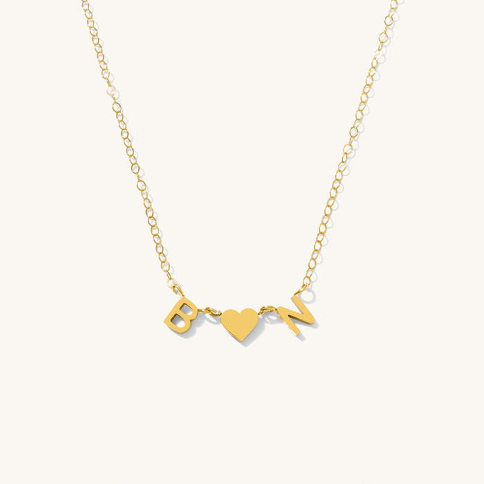 Detail of the gold Everyday Initial necklace by Beads by Tara