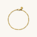 Close up of a gold chain bracelet on a white background