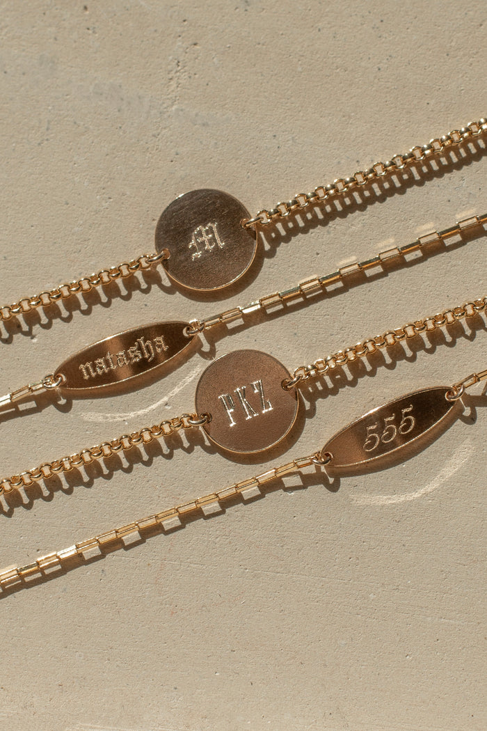 Dainty Fiona bracelet with a smooth oval pendant ready for engraving