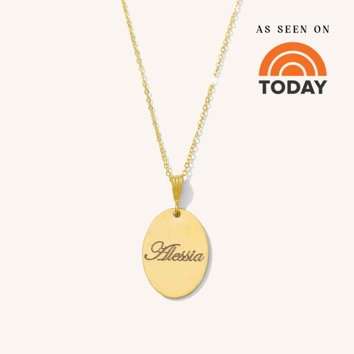 The Fiona necklace, an engravable oval pendant in 14k gold fill
