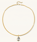 Gold Frankie collar necklace shown with its interchangeable stone pendants