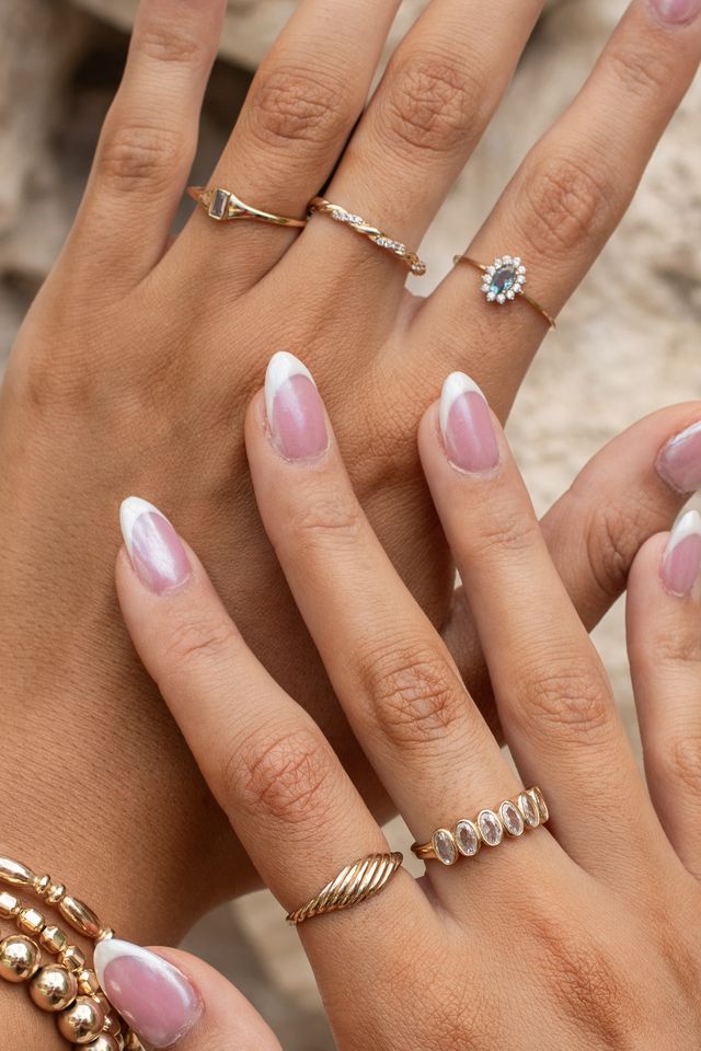The gold French Twist ring, a modern take on a traditional signet band