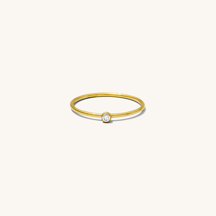 Gemma ring in 14k gold fill with a petite two millimeter CZ stone