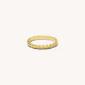 The Goldie ring with a vintage-inspired twisted rope band in gold