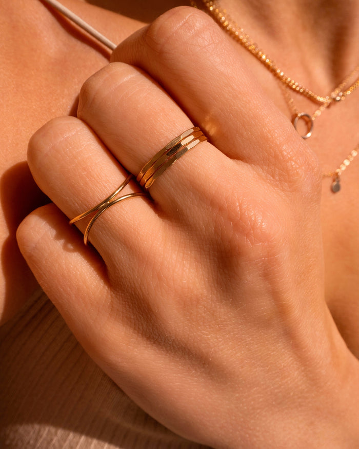 The gold-filled Hammered ring worn stacked in multiples on the hand