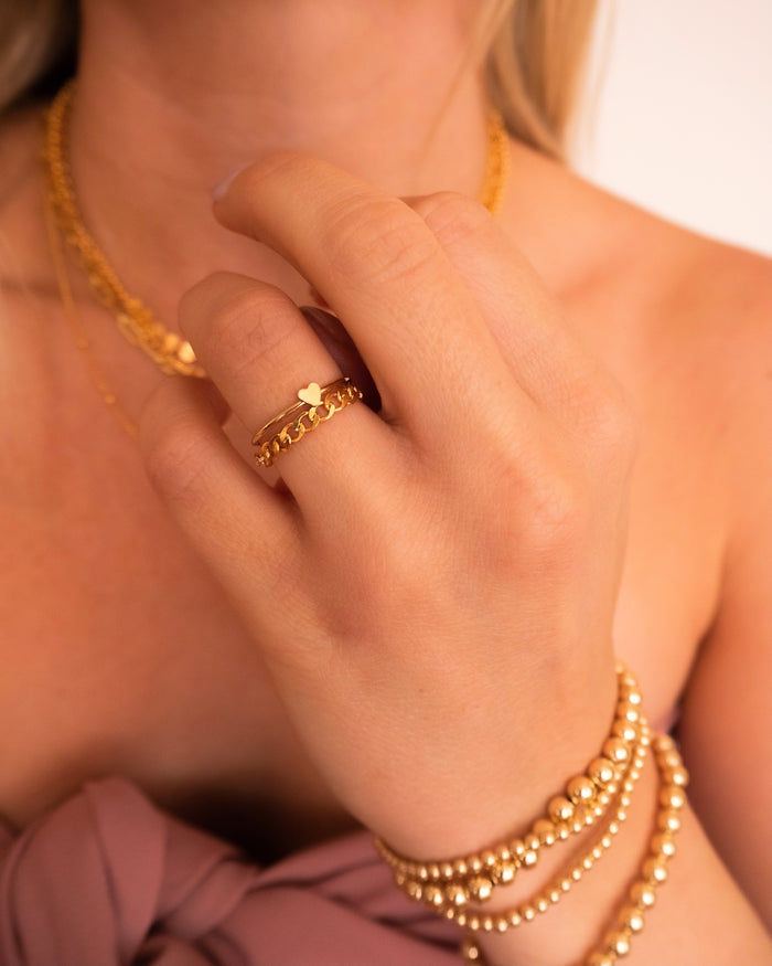 Close up of a hand wearing the lightweight Harper chain ring