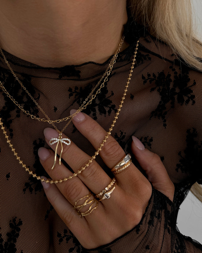 Gold Heartstring necklace, part of the Beads by Tara collection