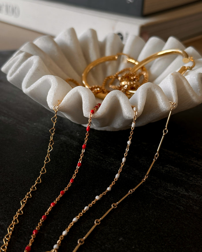 A closer look at the gold Heartstring necklace, part of the Beads by Tara jewelry collection