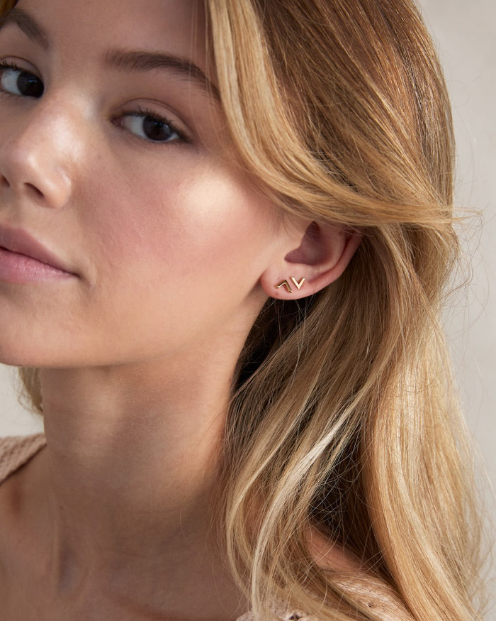 Model wearing Highs and Lows Stud Earrings
