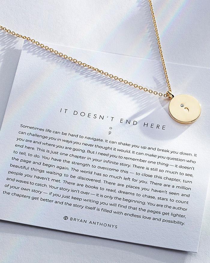 It Doesn't End Here Necklace showcase in 14k gold on card