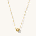 Jackie necklace, a single gold bead on a dainty adjustable chain