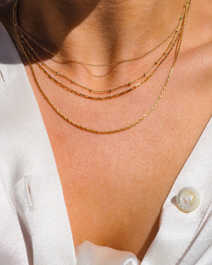 Joy necklace in 14k gold fill with brilliant square links that catch the light