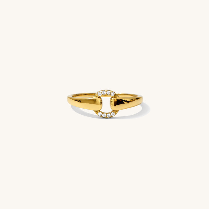 Karma ring, a two-tone design with a gold band and pavé circular accent