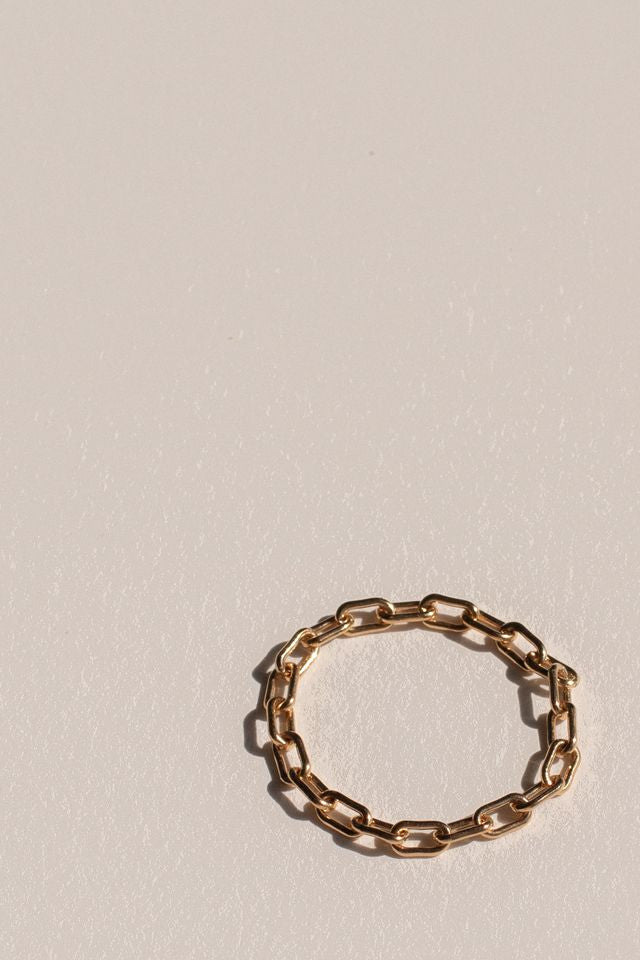 Detail of the Kaylee chain ring's individual gold-filled links and open form