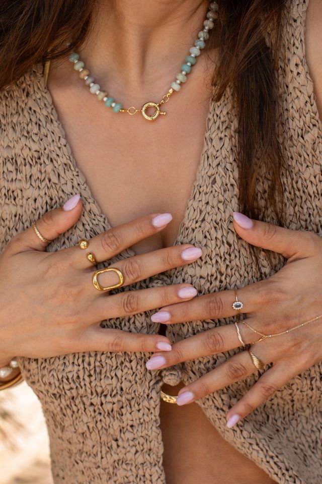 Lava ring detail showing its uneven sculpted edges and statement centerpiece