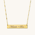 The Lennon bar necklace, a longer engravable bar in 14k gold fill