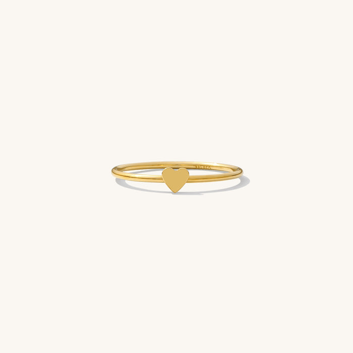 Love Me ring, a dainty 14k gold fill band with a delicate heart detail