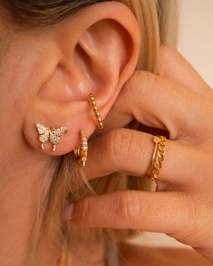 Lightweight gold-filled Love Me ring styled in an everyday ring stack