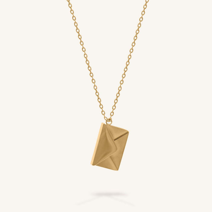 Love Note pendant engraved with a short message on a dainty chain