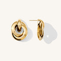 Close up of gold accent studs on a white background