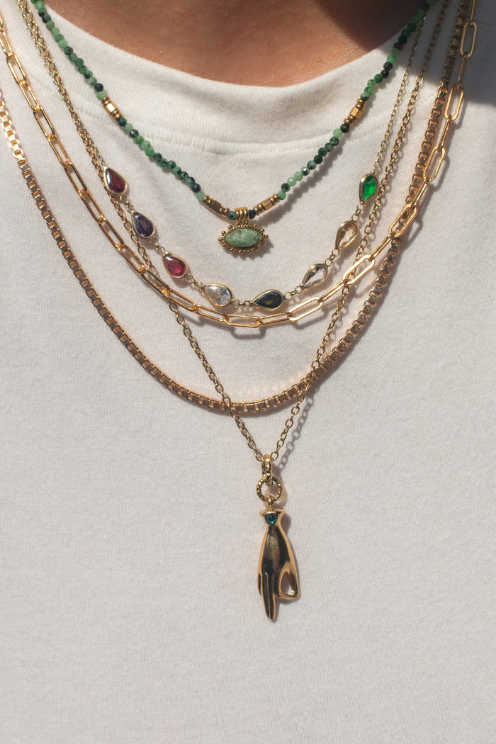 Close view of the jewel-tone gemstones along the Lyla necklace