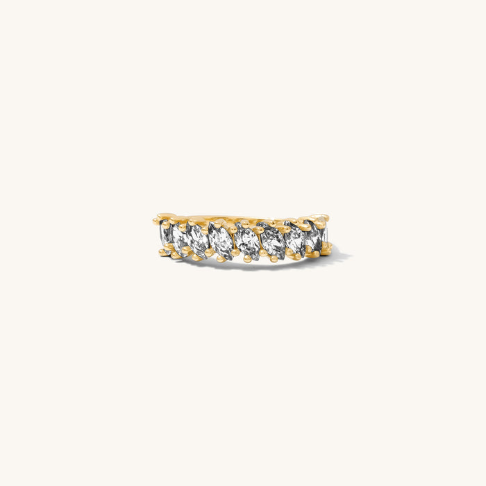 Close up of the gold Markie marquise ring on a white background