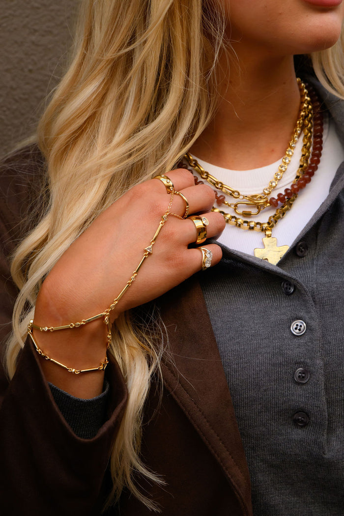 The Marquise cigar band ring in gold, a statement band for everyday wear