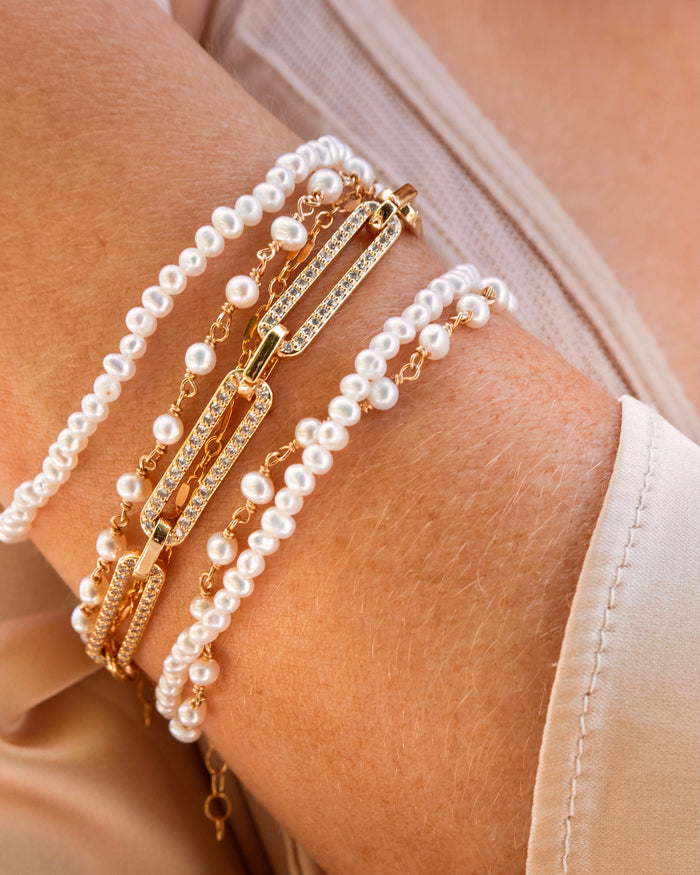Maui pearl wire bracelet stacked with a diamond link bracelet