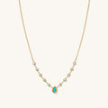 Mermaid Tears necklace in 14k gold fill with a turquoise inlay pendant