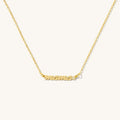 Mini diamond mama name plate necklace in 14k gold fill with a white topaz