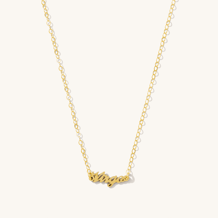Mini zodiac necklace in 14k gold fill with a tiny zodiac sign pendant